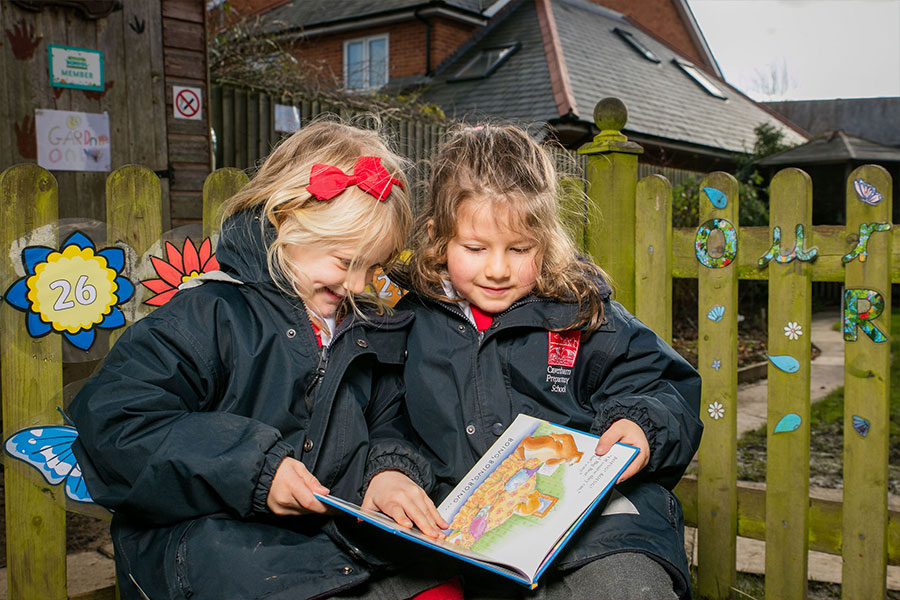 Early Years pupils reading at Caversham Prep