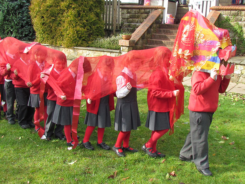 Caversham Prep pupils creating a Chinese dragon