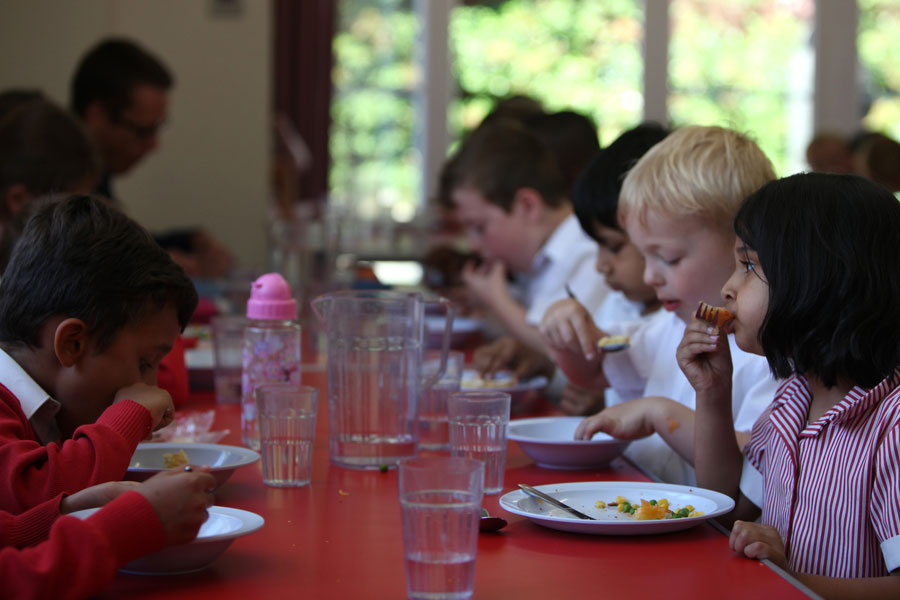Caversham Prep pupils eating in the dining room