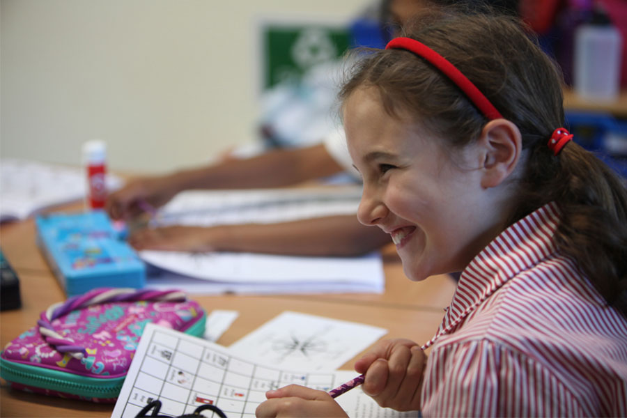 Caversham Prep pupil learning in a classroom